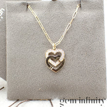 Charger l'image dans la galerie, Dinh Van Pendentif menottes coeurs or et diamants sur chaîne
