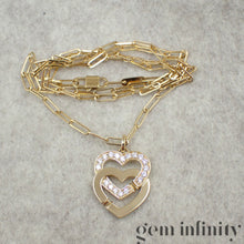 Charger l'image dans la galerie, Dinh Van Pendentif menottes coeurs or et diamants sur chaîne