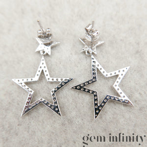 White gold and diamond star ear pendants