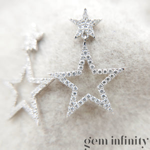 White gold and diamond star ear pendants