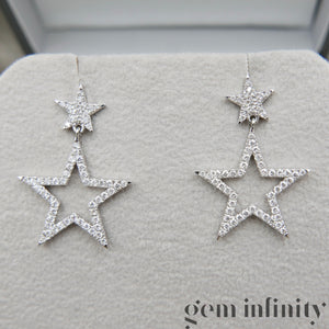 White gold and diamond star ear pendants