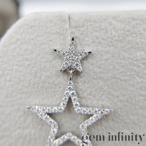 White gold and diamond star ear pendants