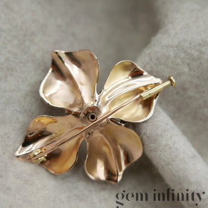 Broche fleur vintage or rose, diamants et saphirs roses