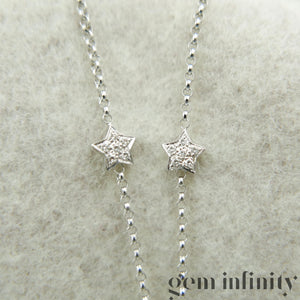 Collier étoiles or gris et diamants