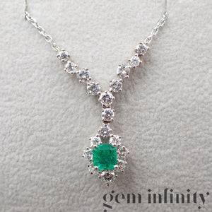 Collier or gris émeraude et diamants