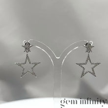 Load and play the video in Gallery viewer, White gold and diamond star ear pendants
