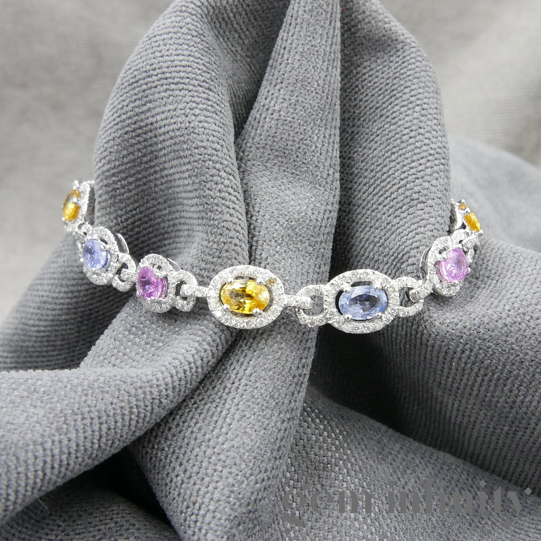 Bracelet or gris, saphirs de couleurs et diamants