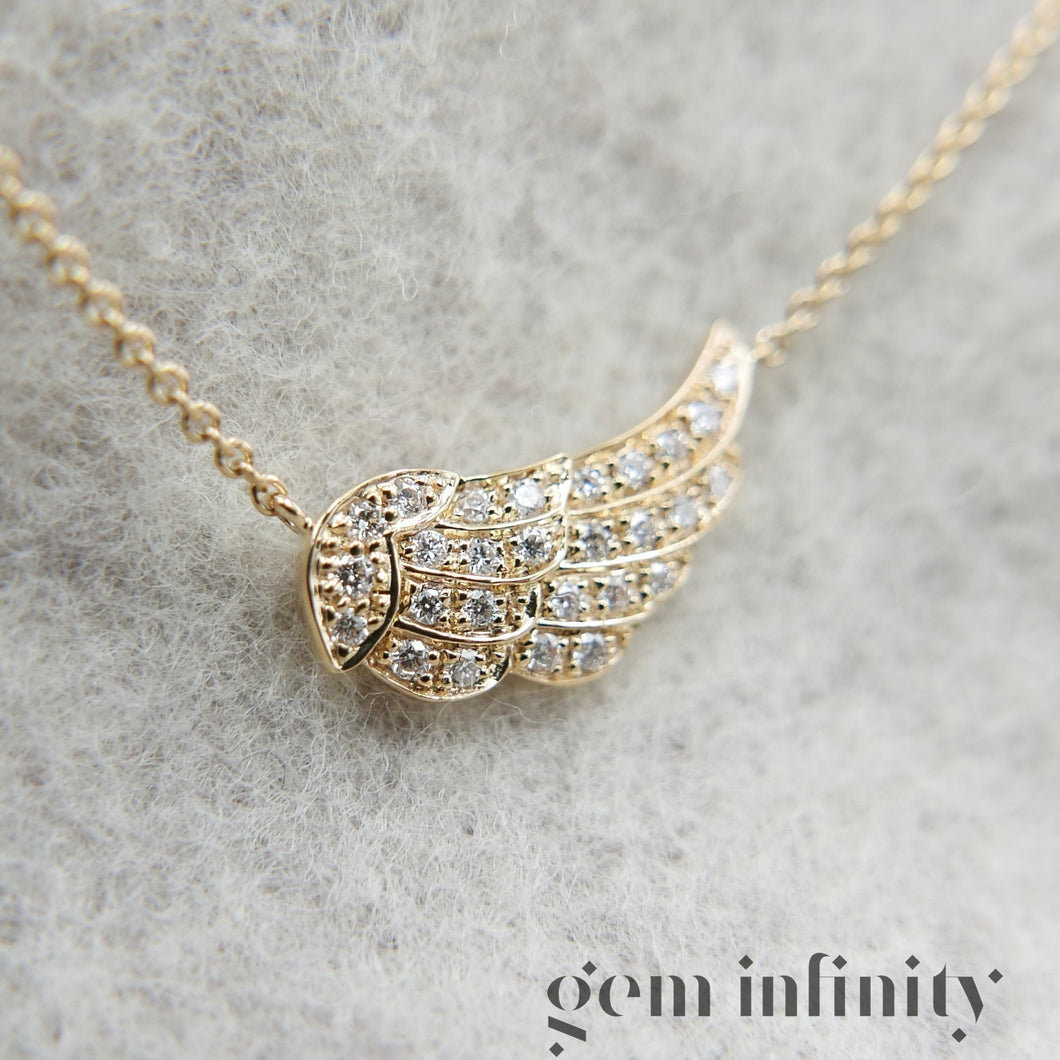 Collier aile d'ange or jaune serti de diamants