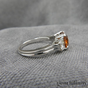 Bague or gris, zircon brun et diamants