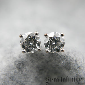 Paire de boucles d'oreilles or gris et diamants