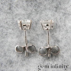 Paire de boucles d'oreilles or gris et diamants