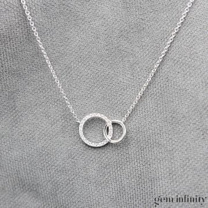 Collier or gris double cercles et diamants