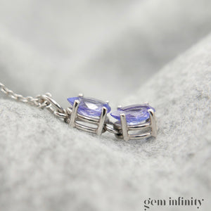 Pendentif or gris gouttes de tanzanites, chaîne