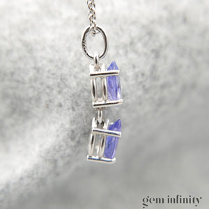 Pendentif or gris gouttes de tanzanites, chaîne