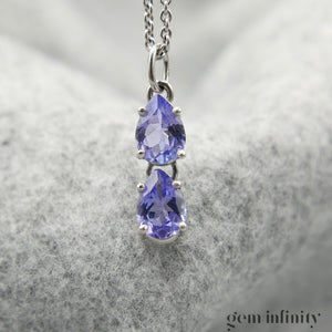 Pendentif or gris gouttes de tanzanites, chaîne