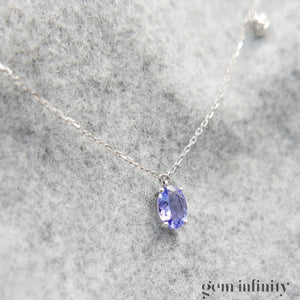 Collier or gris, tanzanites et diamants