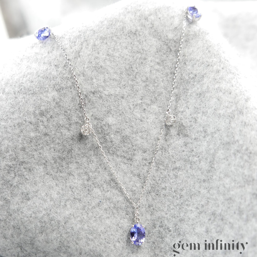 Collier or gris, tanzanites et diamants