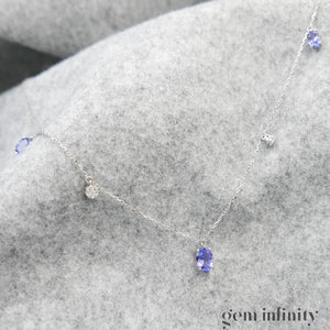 Collier or gris, tanzanites et diamants