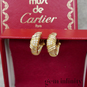 Cartier, boucles d’oreilles trois ors et diamants