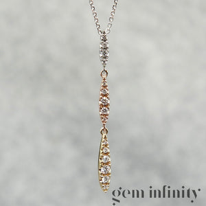 Collier or rose, jaune et gris serti de diamants