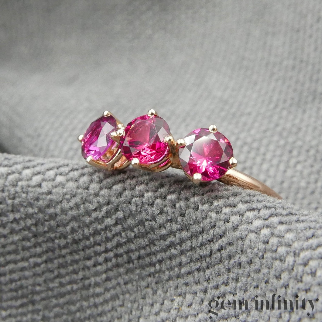 Bague or rose et rubis