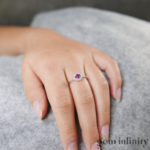 Bague or gris rubis et diamants