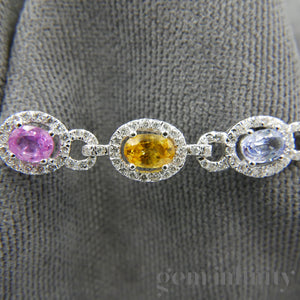 Bracelet or gris, saphirs de couleurs et diamants