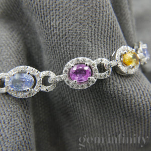 Bracelet or gris, saphirs de couleurs et diamants