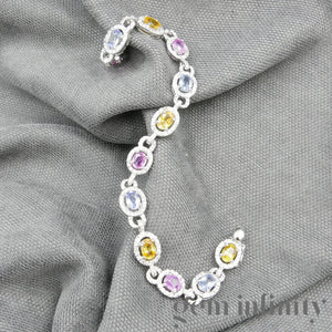 Bracelet or gris, saphirs de couleurs et diamants