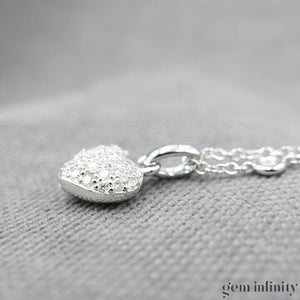 Collier pendentif or gris et diamants