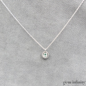 Collier or gris émeraude et diamants