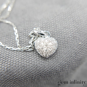 Collier pendentif coeur or gris et diamants