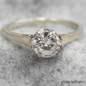 bague solitaire or gris et diamant