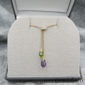 Gold necklace, peridot amethyst briolettes and diamonds